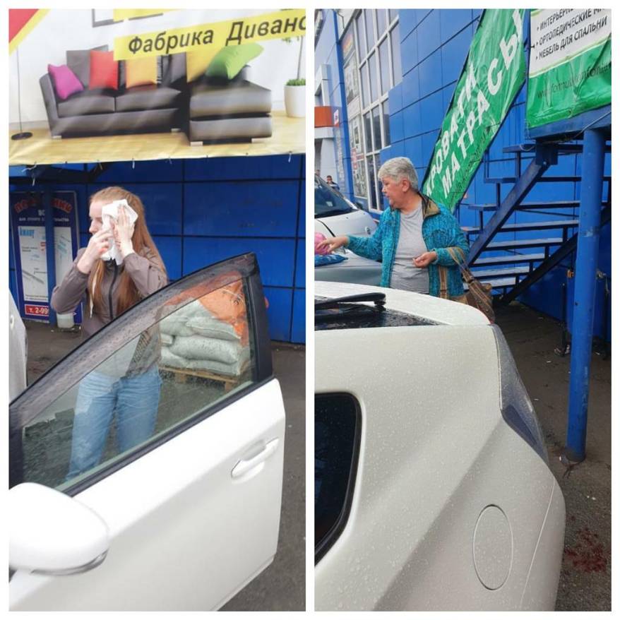 Девушка и пенсионерка устроили "спарринг" на парковке ТЦ (фото)